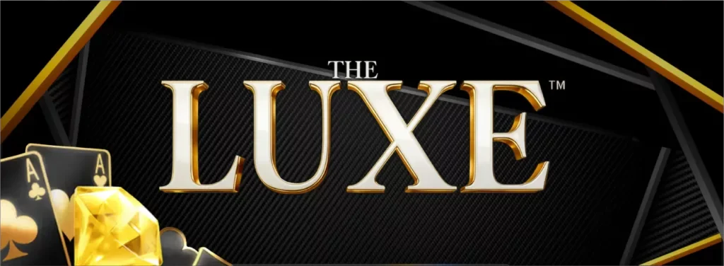 QT電子奢華老虎機遊戲畫面，THE LUXE 主題結合高級撲克牌、籌碼與奢華視覺設計